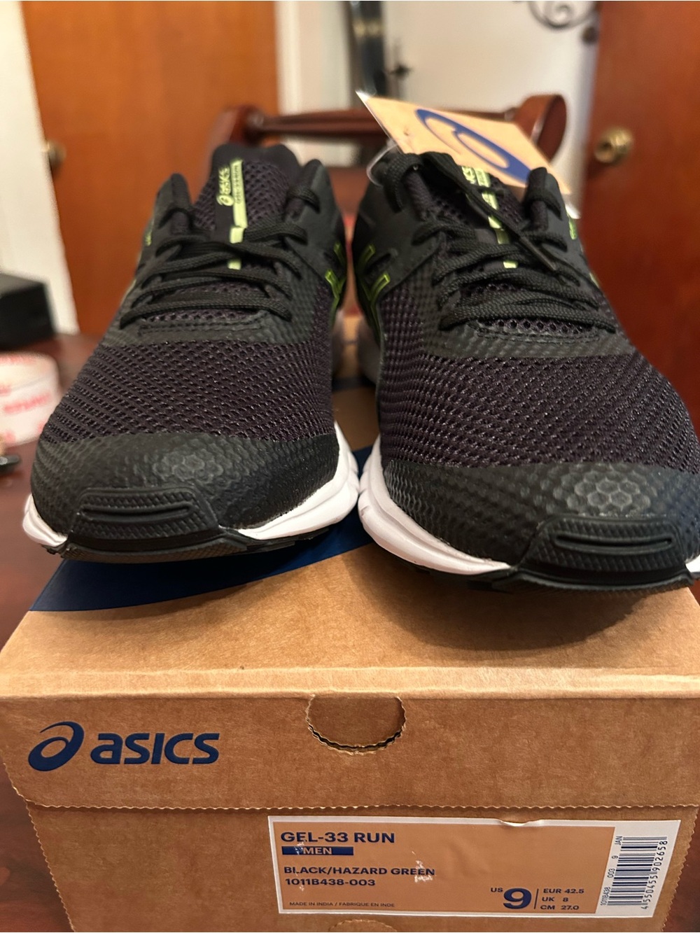 Asics Men’s Black Running Shoes with Hazard Green Accents